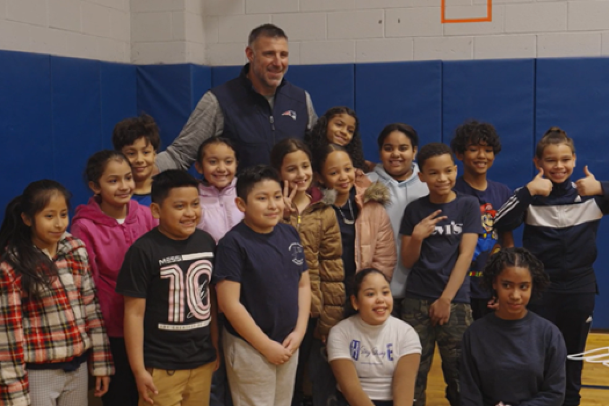 Vrabel with group of students