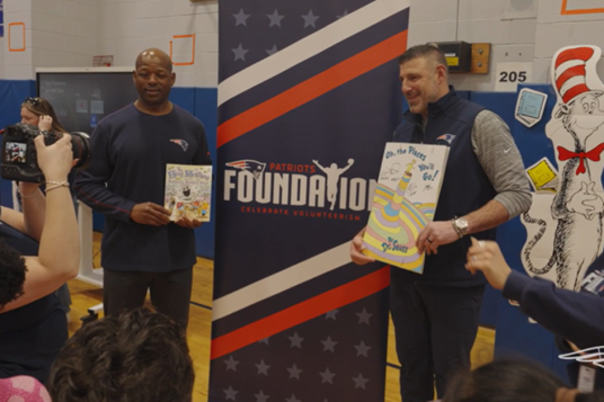 Vrabel holding Dr. Seuss book