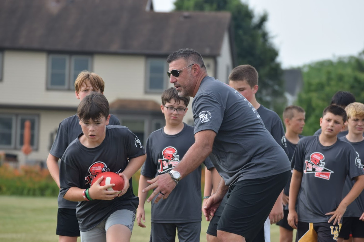 Vrabel coaching kids at 2nd & 7 Camp